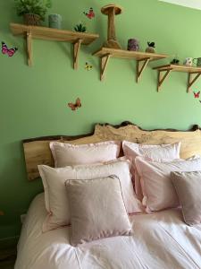 Postel nebo postele na pokoji v ubytování Aux murmures de la nature B&B
