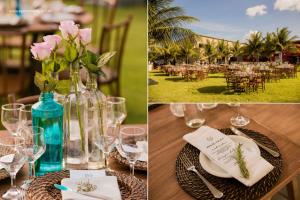 une table avec des verres et des fleurs et une table avec des chaises dans l'établissement Pousada Macamirim, à Macaíba