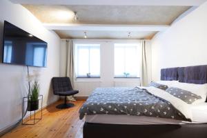 Cama ou camas em um quarto em Gemütliche Altbauwohnung für Paare