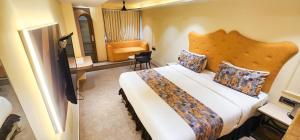 Postel nebo postele na pokoji v ubytování Hotel Nova Bling