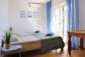 En eller flere senge i et værelse på Casa Magda and Luke + 29 billeder