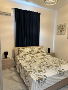 Katil atau katil-katil dalam bilik di Villa Genvic