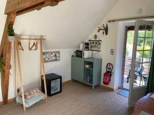 Kuchyň nebo kuchyňský kout v ubytování Aux murmures de la nature B&B