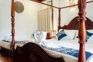 Posteľ alebo postele v izbe v ubytovaní Villa Khili Namkhan