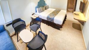 Postel nebo postele na pokoji v ubytování Hotel Nova Bling