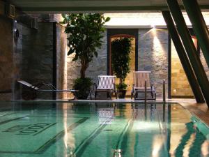 Bazén v ubytovaní Hotel Monopol alebo v jeho blízkosti