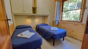 Postel nebo postele na pokoji v ubytování Casa Bentu 'E Mare con vista