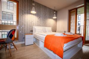 Posteľ alebo postele v izbe v ubytovaní Main Station&Old Town Suites by Inpoint