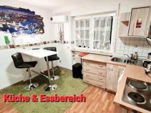 Kuchyň nebo kuchyňský kout v ubytování Hotel Garni Rodenbach