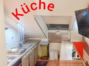Kuchyň nebo kuchyňský kout v ubytování Hotel Garni Rodenbach + 37 fotografií