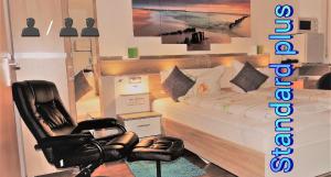 Postel nebo postele na pokoji v ubytování Hotel Garni Rodenbach