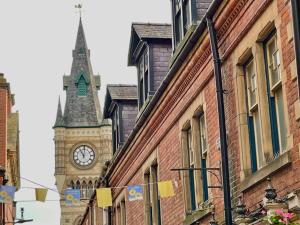 a clock tower in the distance with big ben at Central Darlington 2 Bed Flat #8 in Darlington