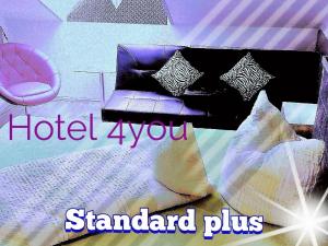 Postel nebo postele na pokoji v ubytování Hotel Garni Rodenbach