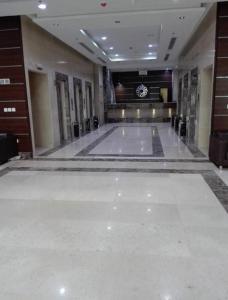 a large empty dance floor in a building at Arfalon Hotel and Tourism in Makkah