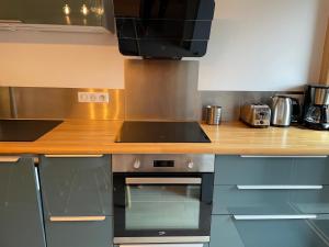 Kuchyň nebo kuchyňský kout v ubytování Chatel - appartement 2 pièces rénové - 4 personnes - proche centre - ménage inclus