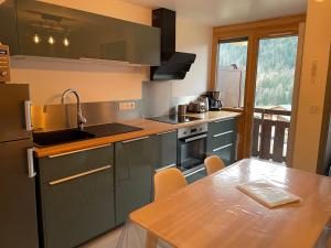 Kuchyň nebo kuchyňský kout v ubytování Chatel - appartement 2 pièces rénové - 4 personnes - proche centre - ménage inclus