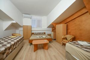 Postelja oz. postelje v sobi nastanitve Hostel Izvor