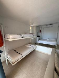 En eller flere senge i et værelse på ESTUDIO DOS PLAYAS LA MANGA