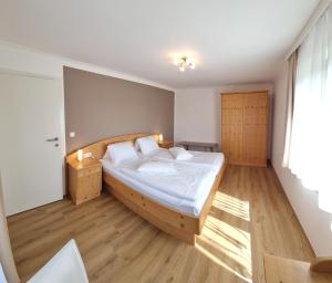 Posteľ alebo postele v izbe v ubytovaní Haus Falle