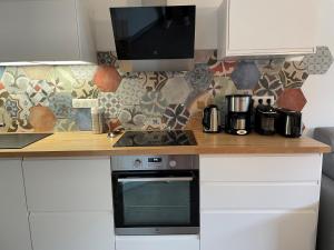 Kuchyňa alebo kuchynka v ubytovaní Chatel - appartement 3 pièces rénové - 6 personnes - proche centre - ménage inclus