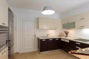 A kitchen or kitchenette at Villa Sevil