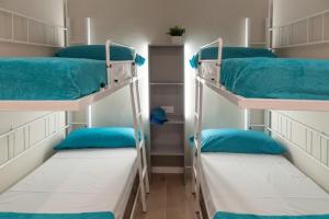 Posteľ alebo postele v izbe v ubytovaní Apartamento en primera linea de mar en La Escala