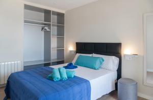 Posteľ alebo postele v izbe v ubytovaní Apartamento en primera linea de mar en La Escala