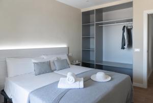 Posteľ alebo postele v izbe v ubytovaní Apartamento en primera linea de mar en La Escala