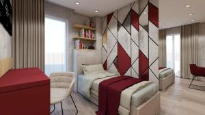 1 dormitorio con 1 cama, 1 silla y 1 mesa en Arel Hotel en Sarandë