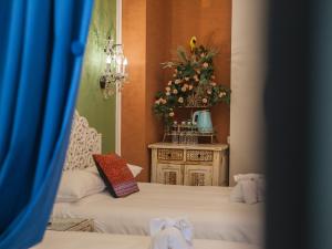 Ένα ή περισσότερα κρεβάτια σε δωμάτιο στο Anna King Hotel