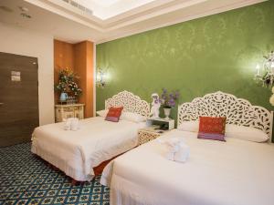 Ένα ή περισσότερα κρεβάτια σε δωμάτιο στο Anna King Hotel