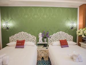 Ένα ή περισσότερα κρεβάτια σε δωμάτιο στο Anna King Hotel