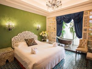 Ένα ή περισσότερα κρεβάτια σε δωμάτιο στο Anna King Hotel