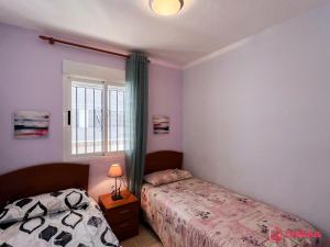 Postel nebo postele na pokoji v ubytování Vistoso y Colorido + 37 fotografií