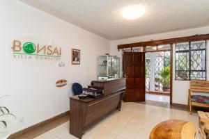 TV a/nebo společenská místnost v ubytování Bonsai Villa