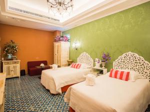 Ένα ή περισσότερα κρεβάτια σε δωμάτιο στο Anna King Hotel