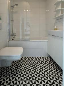 Ένα μπάνιο στο Apartament przy Rotundzie