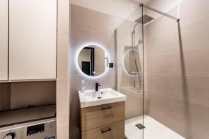 a bathroom with a sink and a shower at The incredible Suite Moulin - brand new 2022 in Lyon