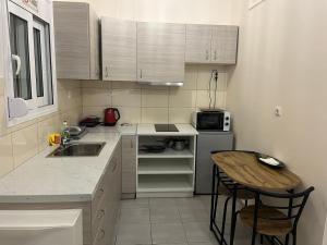 Kuchyňa alebo kuchynka v ubytovaní Golden Fleece Apartment VIPGreece