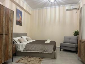 Posteľ alebo postele v izbe v ubytovaní Golden Fleece Apartment VIPGreece