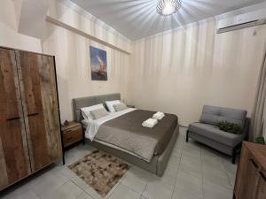 Posteľ alebo postele v izbe v ubytovaní Golden Fleece Apartment VIPGreece