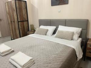 Posteľ alebo postele v izbe v ubytovaní Golden Fleece Apartment VIPGreece