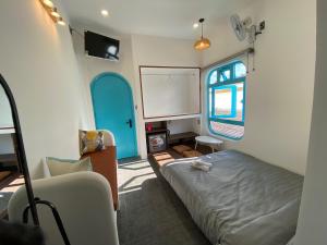 TV a/nebo společenská místnost v ubytování Homestay BỒ CÔNG ANH