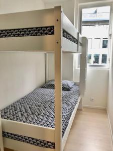 a bedroom with two bunk beds in a room at Antwerp Central Park in Antwerp