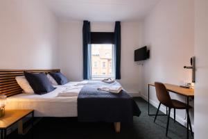 Milling Hotel Mini 19客房内的一张或多张床位