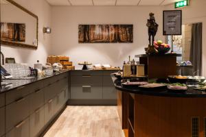 Una cocina o cocineta en Milling Hotel Mini 19