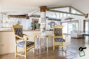 Posezení v ubytování Hotiday Room Collection - Porto Cervo