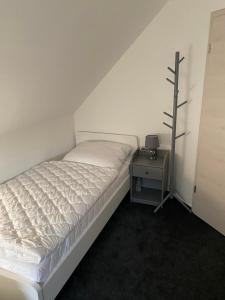 Кровать или кровати в номере Ferienhaus Paula