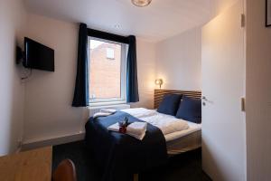 Milling Hotel Mini 19客房内的一张或多张床位