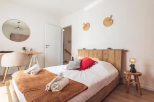 Postel nebo postele na pokoji v ubytování Nouveau - Sweet Garden - Maison avec jardin